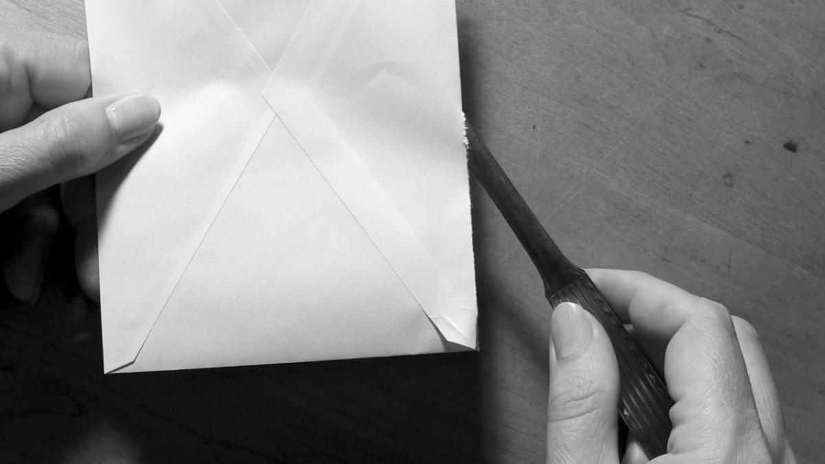 Brieföffner mit Briefumschlag