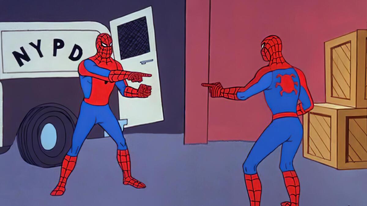 Zwei Spidermen zeigen mit dem Finger auf den anderen