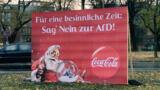 Text auf Plakat: Für eine besinnliche Zeit: Sag nein zur AfD!
