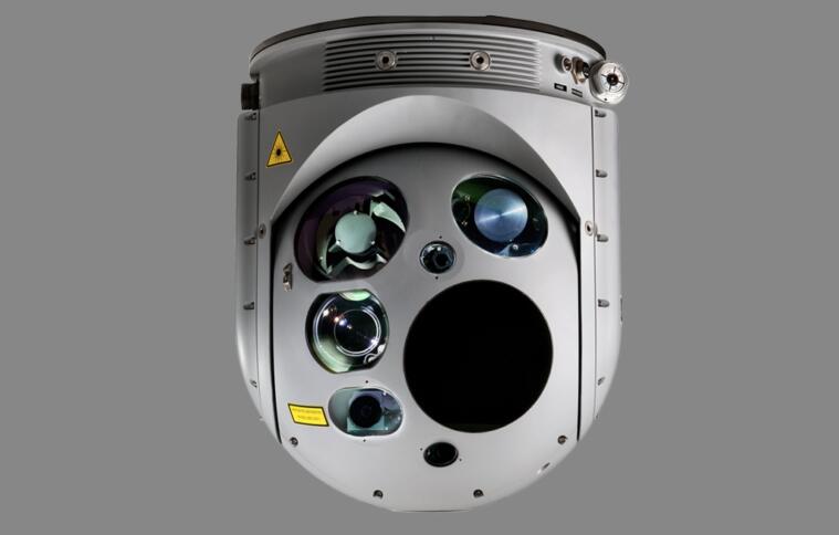 Das Bild zeigt ein halbkugelförmiges graues Gerät, an dessen Vorderseite sich fünf Öffnungen für Kameras und andere Sensoren befinden.