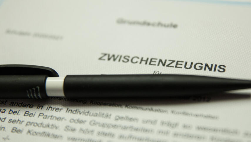 Zeugnis und Stift
