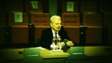 Didier Reynders mit Handy