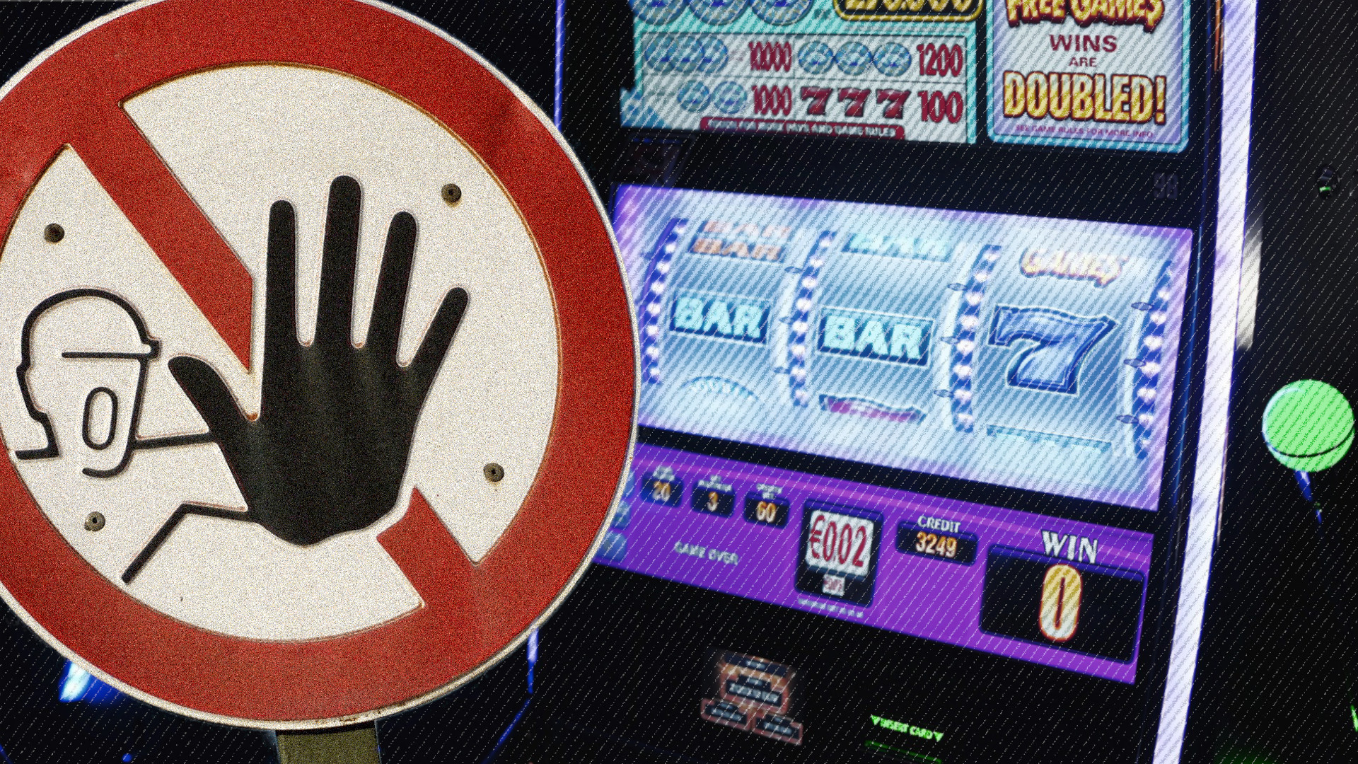 Ein Betreten-verboten-Schild vor einer Slot Machine im Casino