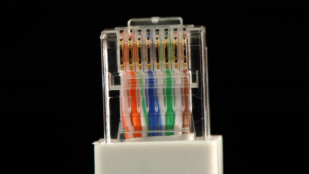 An extremely close up of patch cable over black Copyright: xTitoxWongx/xDesignxPicsx , 31238997 PUBLICATIONxINxGERxSUIxAUTxONLY Copyright: TitoxWongx/xDesignxPics 31238997