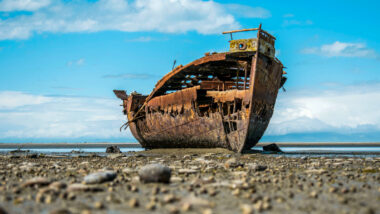 A wrecked ship on dry land