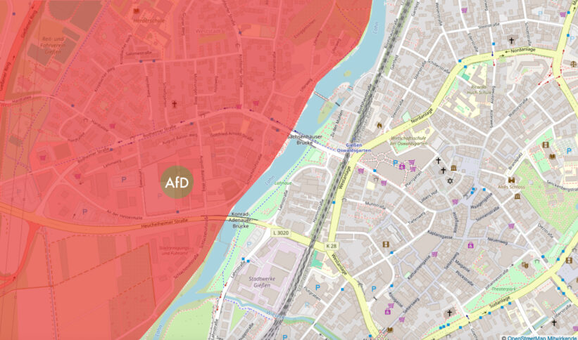 Karte von Gießen, westlicher Teil rot eingefärbt, auf den Messehallen ein brauner Punkt mit Aufschrift AfD