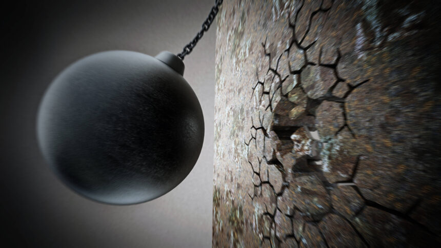 Eine Illustration mit einer schwarzen Abrissbirne, die auf eine Wand zuschwingt