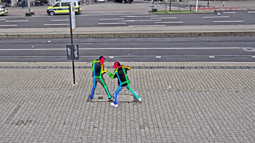 Zwei Menschen bei einer Schlägerei, ihre Körper sind von bunten Strichmännchen überlagert.