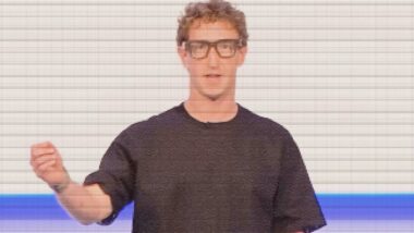 Ein Mann mit Locken und dicker Brille.