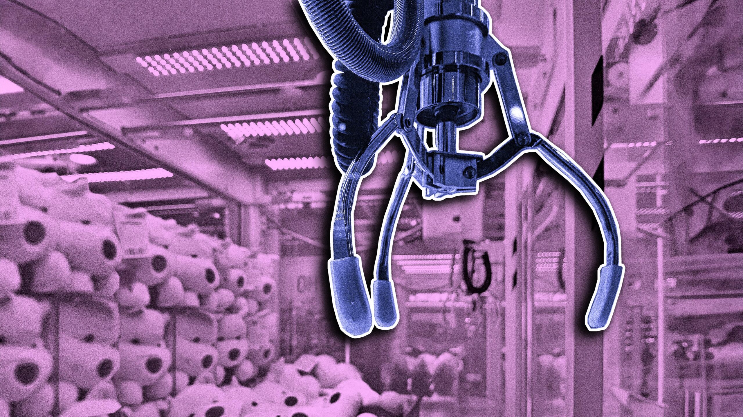 ein Greifarm in einem Automaten voller Kuscheltiere